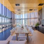 Why is the waterproof performance of doors and windows so important in Malaysia, where the rainy season is frequent?